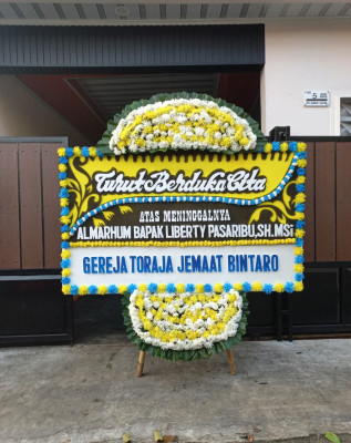 Papan Bunga Duka di Wameo