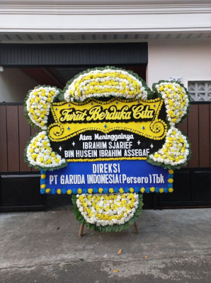 Papan Bunga Duka di Wameo