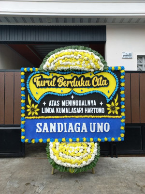 Papan Bunga Duka di Wameo